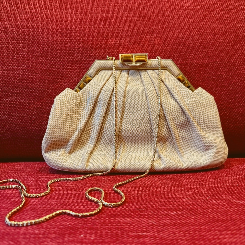 Vintage Judith Leiber lizard skin bag with tiger eye stone details.